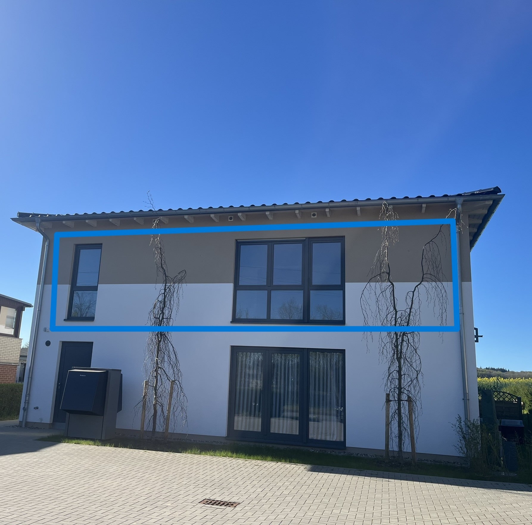 Außenansicht - Obergeschoss-Wohnung